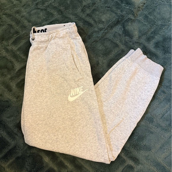 Nike Pants - Grey Nike sweatpants with drawstring waist (minor tears pictured)